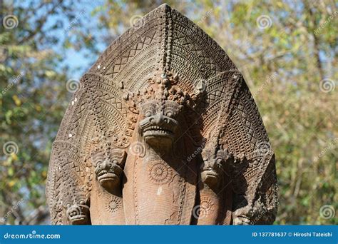 Naga with Six Eyes, Intricate Stone Carving Depicting Divine Power and Mystical Symbolism!